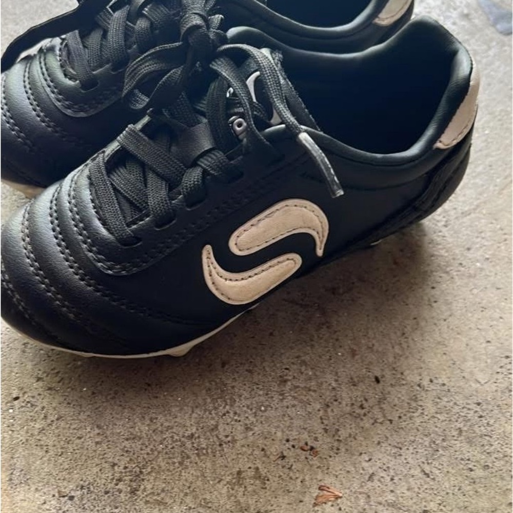 Kids Black cleats with White Accent